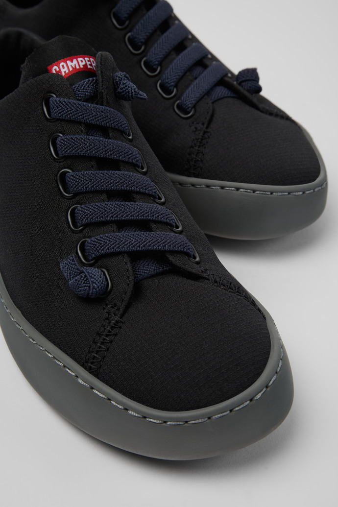 Close-up view of Peu Touring Black Textile Sneaker for Women
