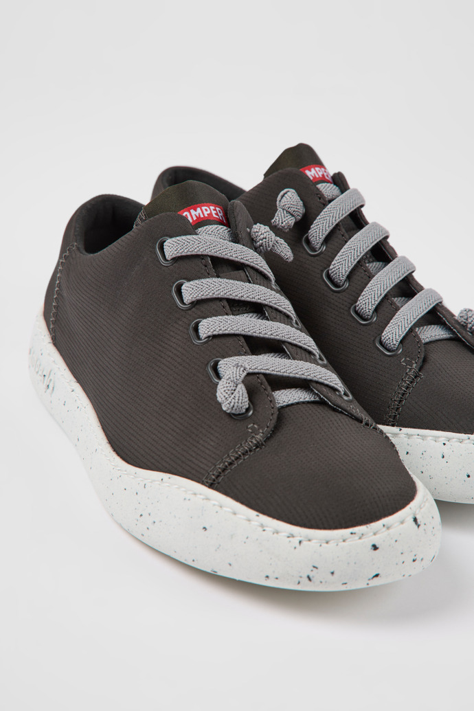 Close-up view of Peu Touring Gray textile sneakers for women