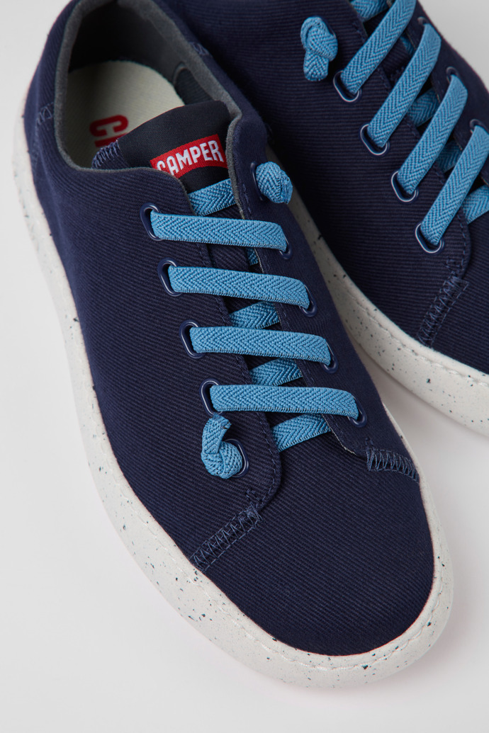Close-up view of Peu Touring Blue textile sneakers for women
