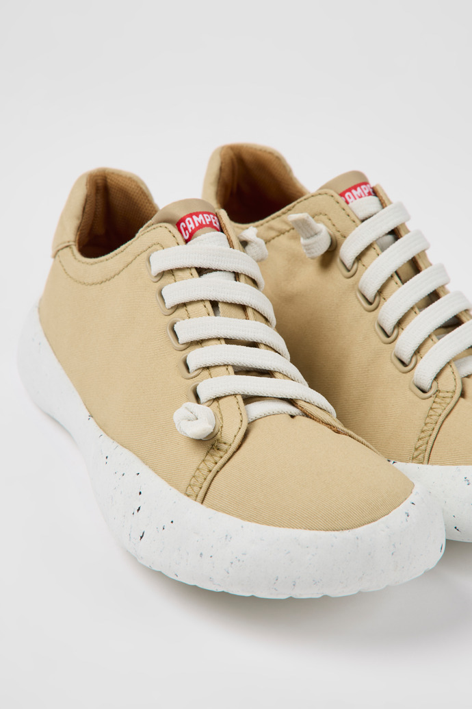 Close-up view of Peu Stadium Beige textile sneakers for women