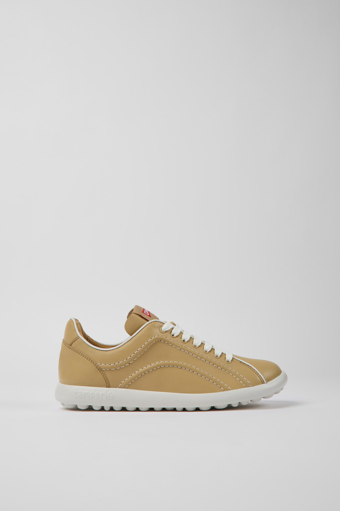 Image of Side view of Pelotas XLite Beige leather sneakers for women