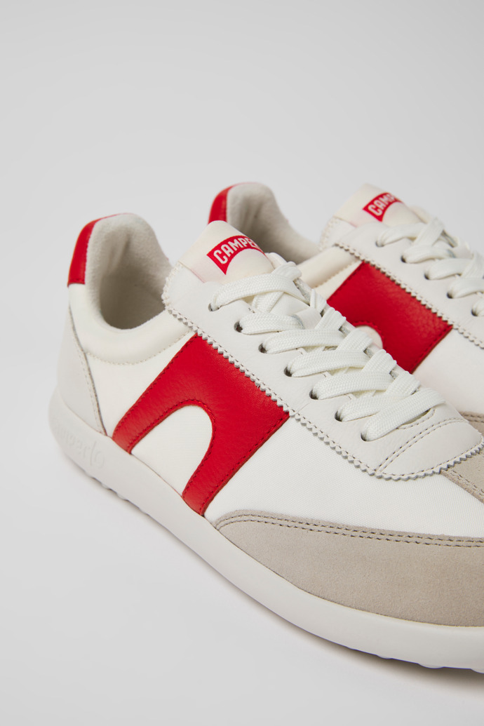 Close-up view of Pelotas XLite White and red leather and textile sneakers for women
