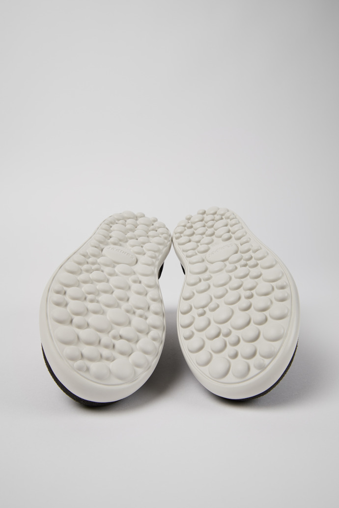 The soles of Pelotas Xlite Black Textile/Leather Sneaker for Women