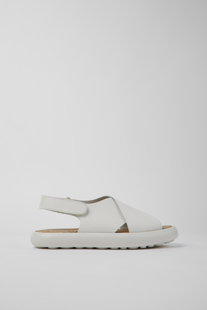 Image of Side view of Pelotas Flota White leather sandals for women