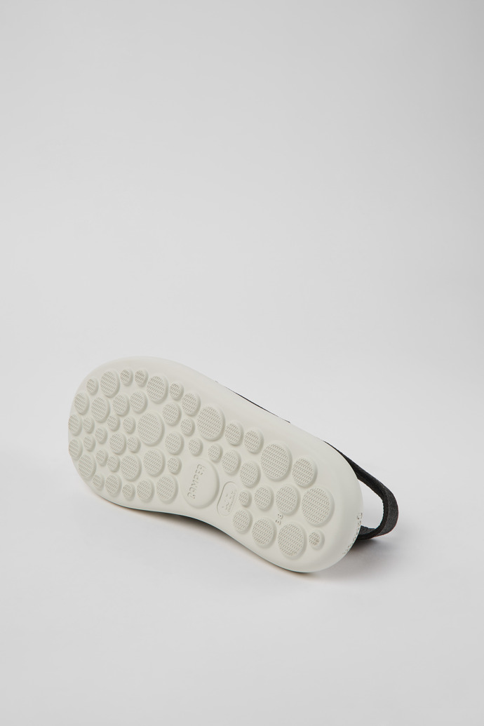 The soles of Pelotas Flota HyphaLite™ Black and white HyphaLite™ sandals for women