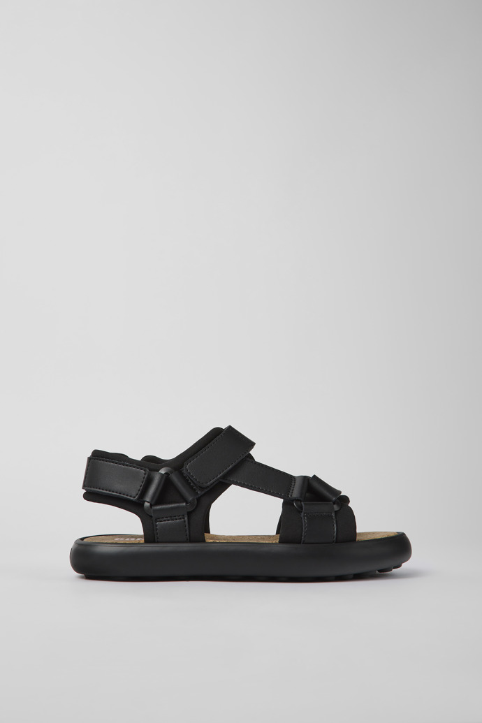 Image of Side view of Pelotas Flota Black leather and textile sandals for women