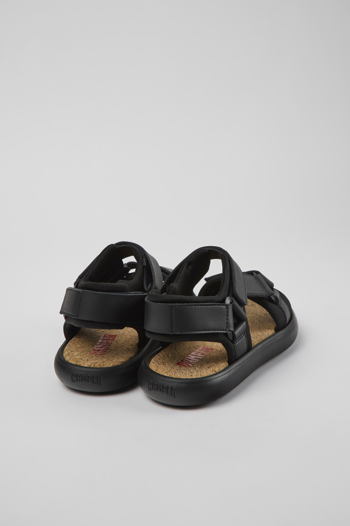 Back view of Pelotas Flota Black leather and textile sandals for women