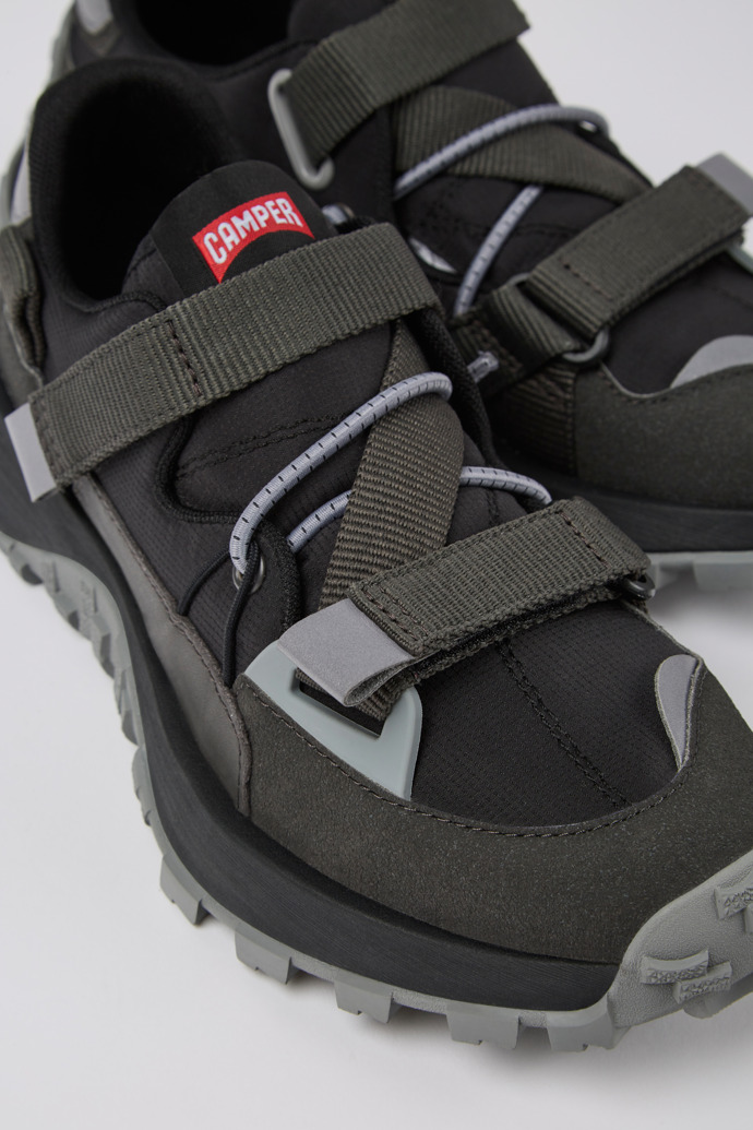 Close-up view of Drift Trail Black and gray textile and nubuck sneakers for women