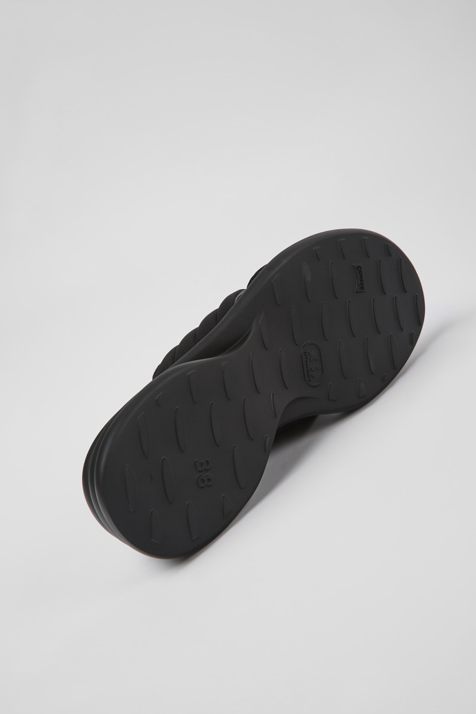The soles of Spiro Black textile sandals for women