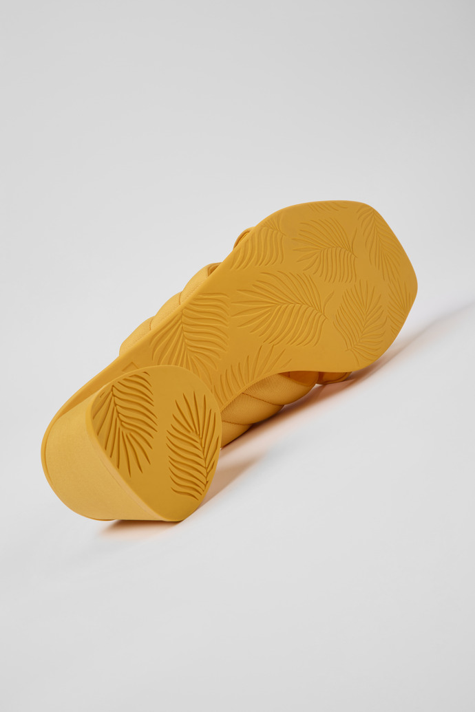 The soles of Kiara Orange textile sandals for women