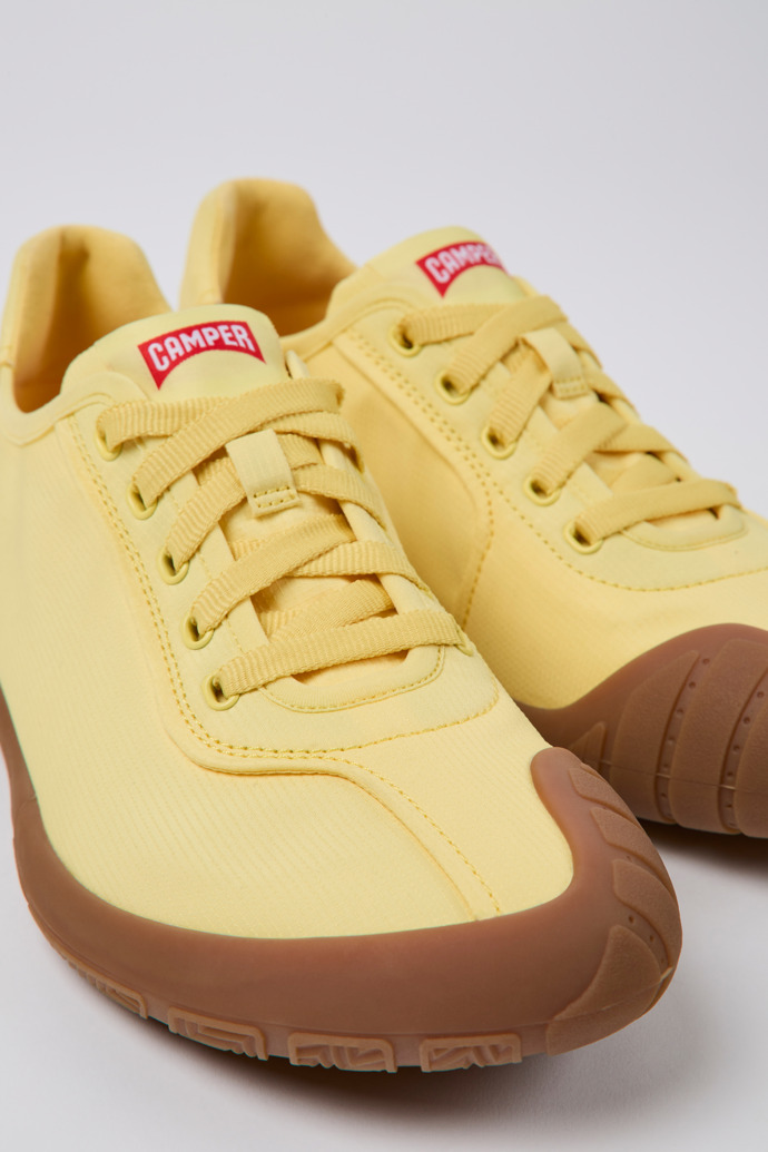 Close-up view of Path Yellow textile sneakers for women