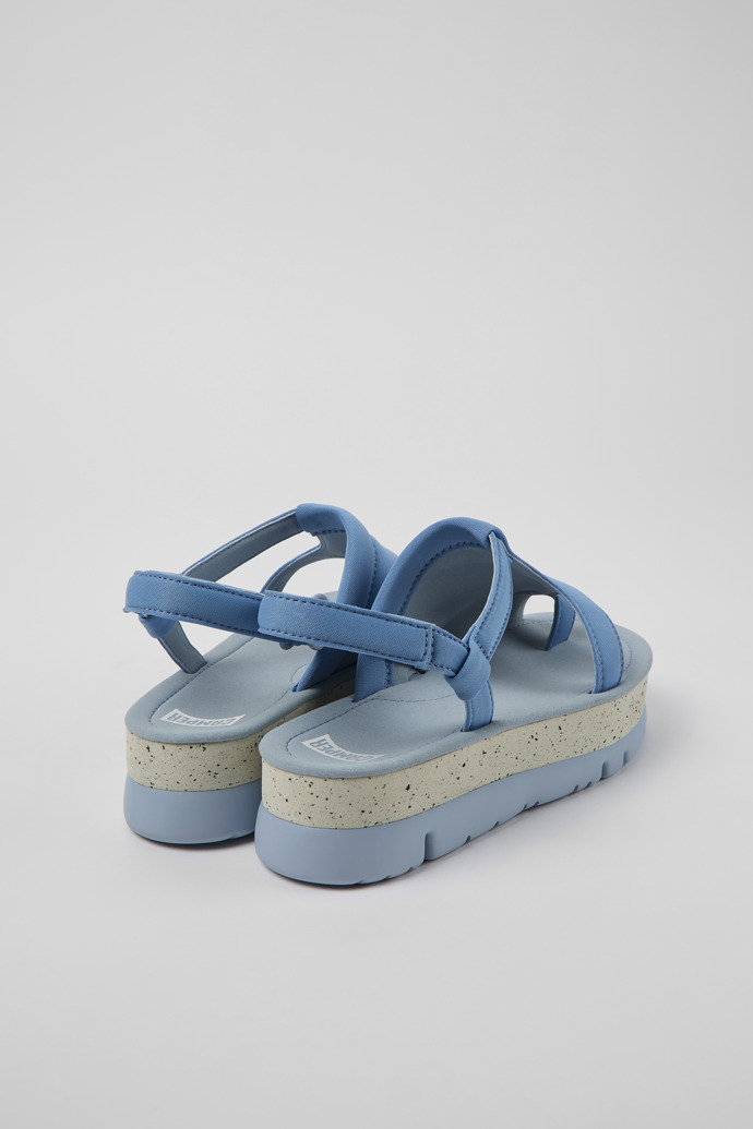 Back view of Oruga Up Blue textile sandals for women