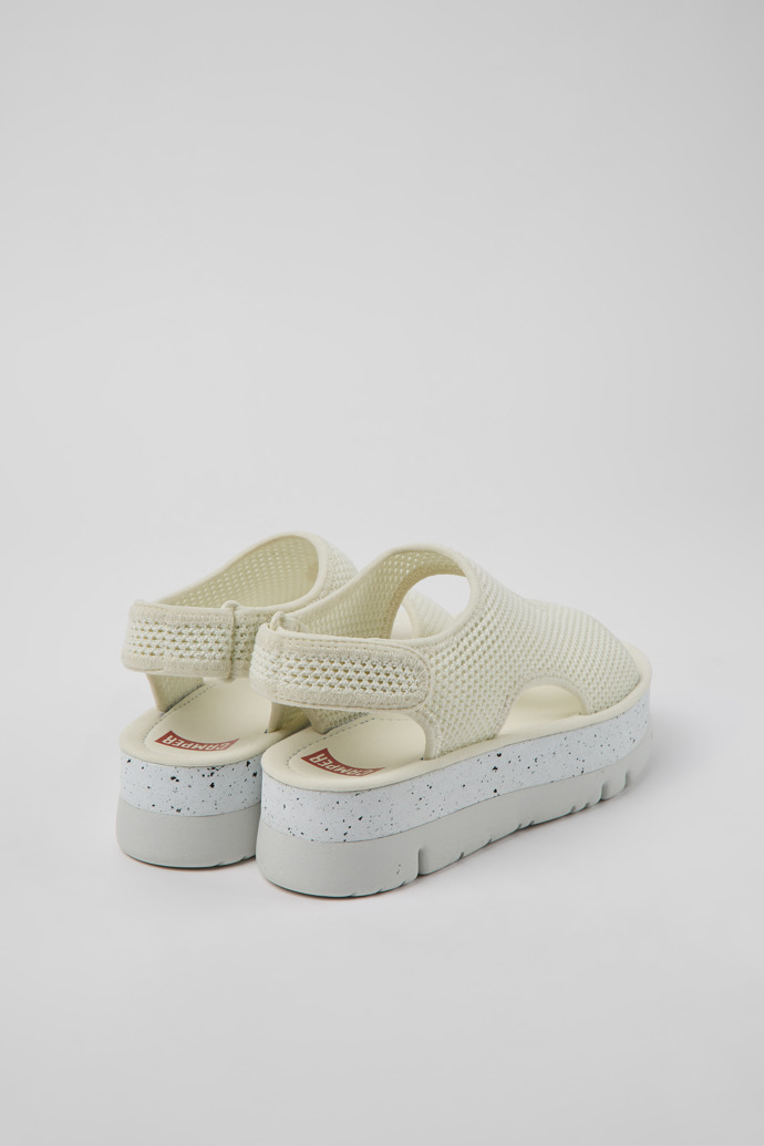 Back view of Oruga Up White textile sandals for women