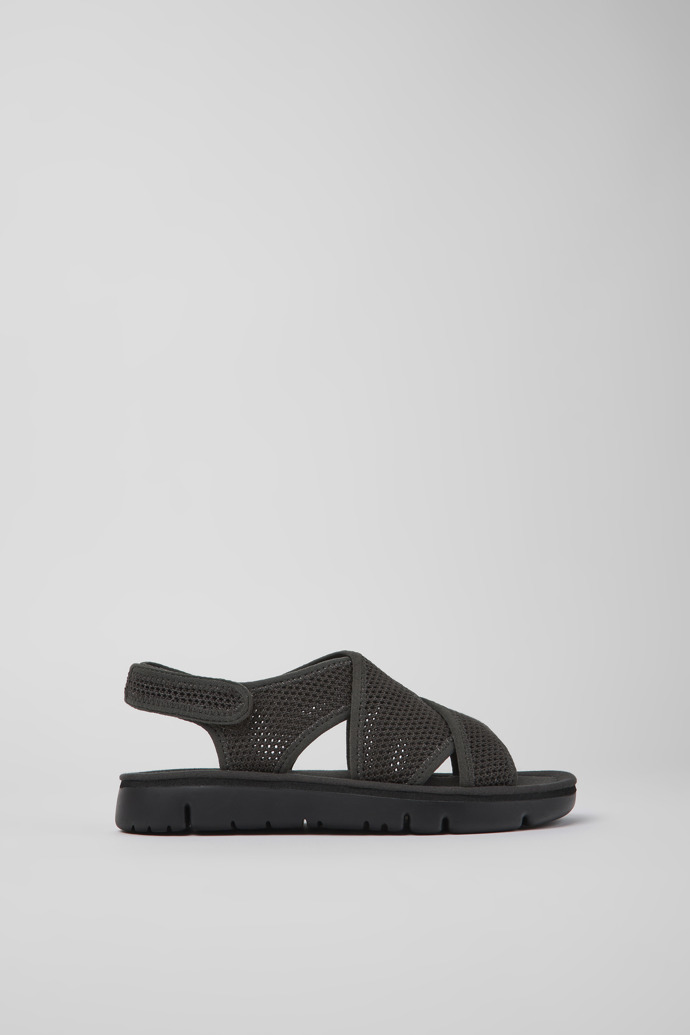 Side view of Oruga Dark gray textile sandals for women
