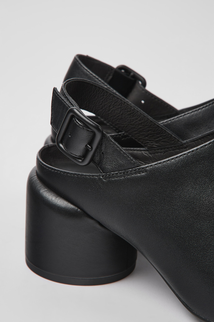 Close-up view of Niki Black leather heels for women