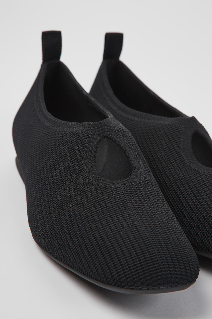 Close-up view of Casi Myra Black one-piece knit ballerinas for women