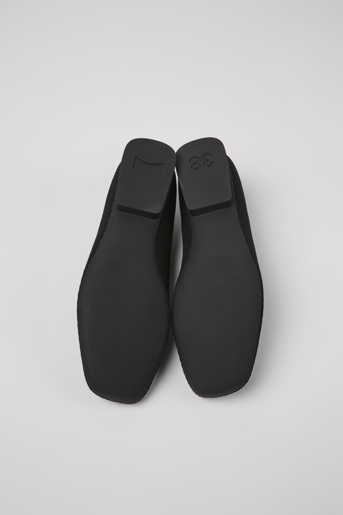 The soles of Casi Myra Black one-piece knit ballerinas for women