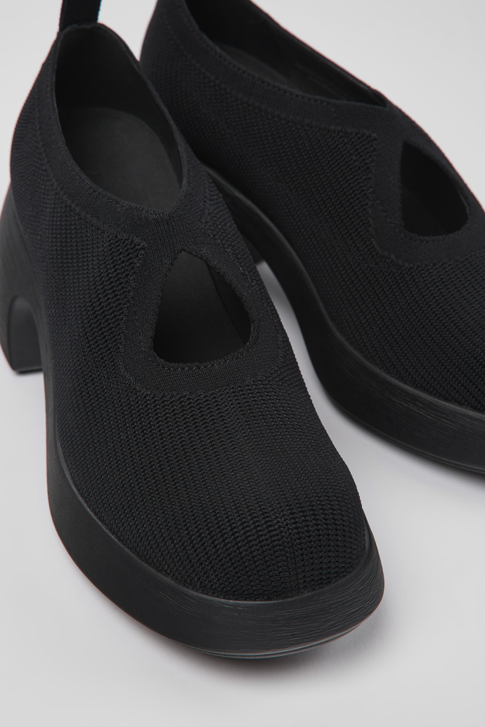 Close-up view of Thelma Black one-piece knit shoes for women