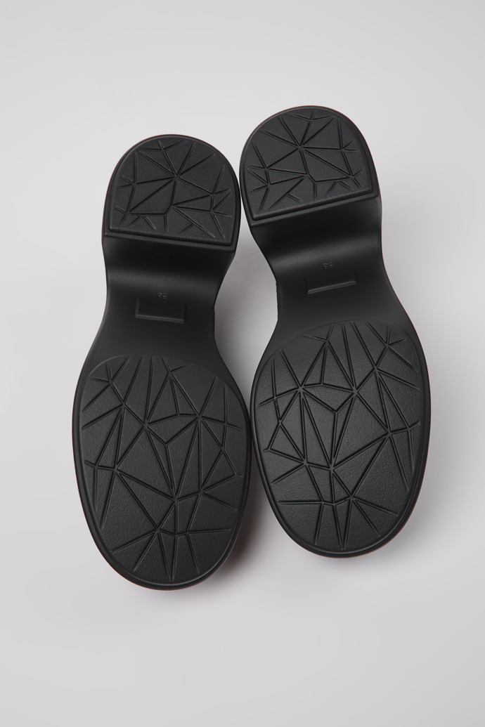 The soles of Thelma Black one-piece knit shoes for women