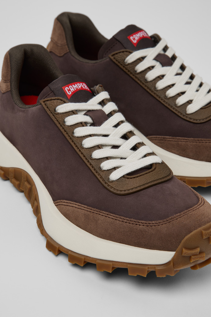 Close-up view of Drift Trail Brown Leather Sneakers for Women.
