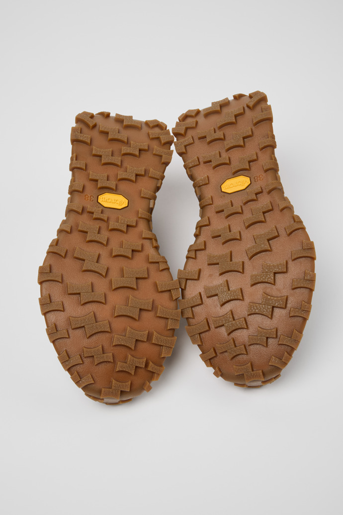 The soles of Drift Trail Brown Leather Sneakers for Women.