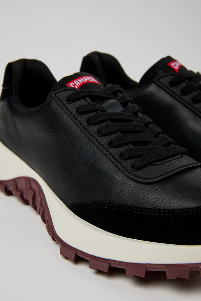 Close-up view of Drift Trail Black Leather and Nubuck Sneakers for Women.