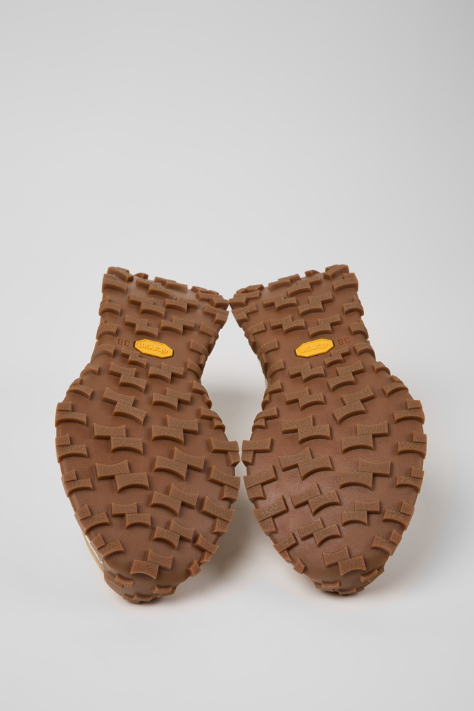 The soles of Drift Trail Beige Leather and Nubuck Sneakers for Women.