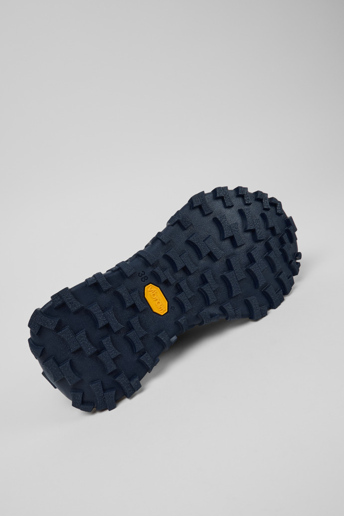 Drift Trail Sneakers de piel negras para mujer.