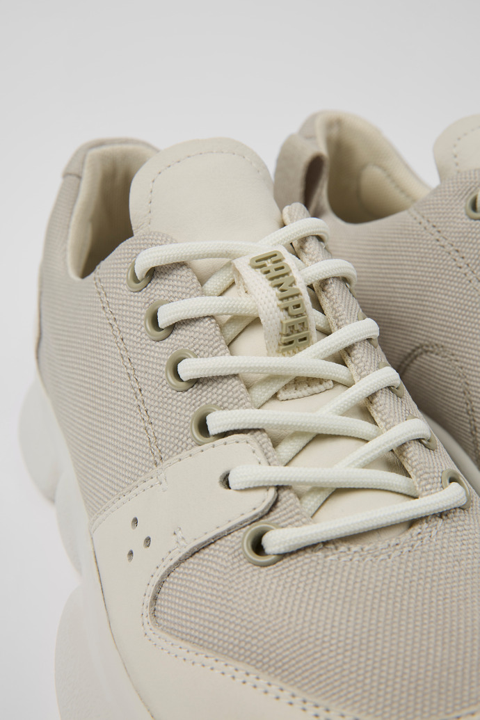 Close-up view of Karst White leather and recycled PET sneakers for women