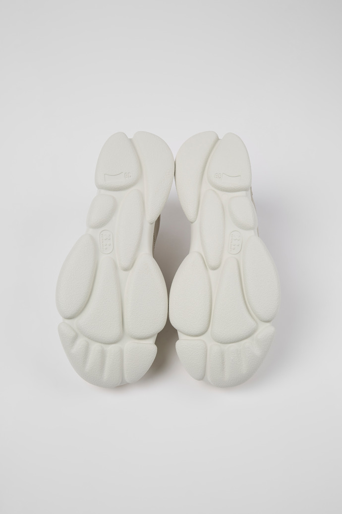 The soles of Karst White leather and recycled PET sneakers for women