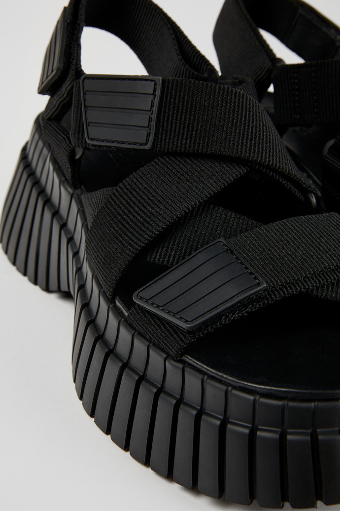 Close-up view of BCN Black Textile Cross-strap Sandal for Women