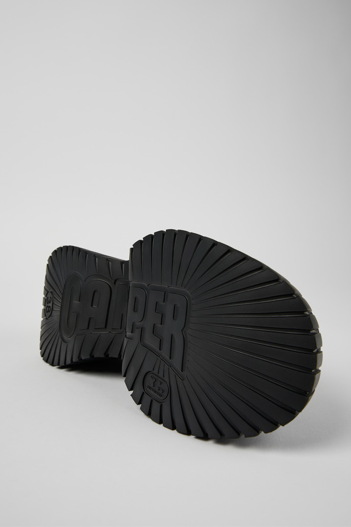 The soles of BCN Black Textile Cross-strap Sandal for Women