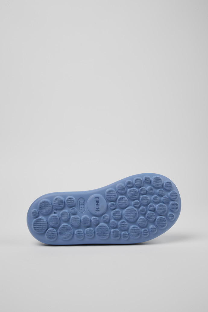 The soles of Pelotas Flota Blue Leather Flip-Flop for Women