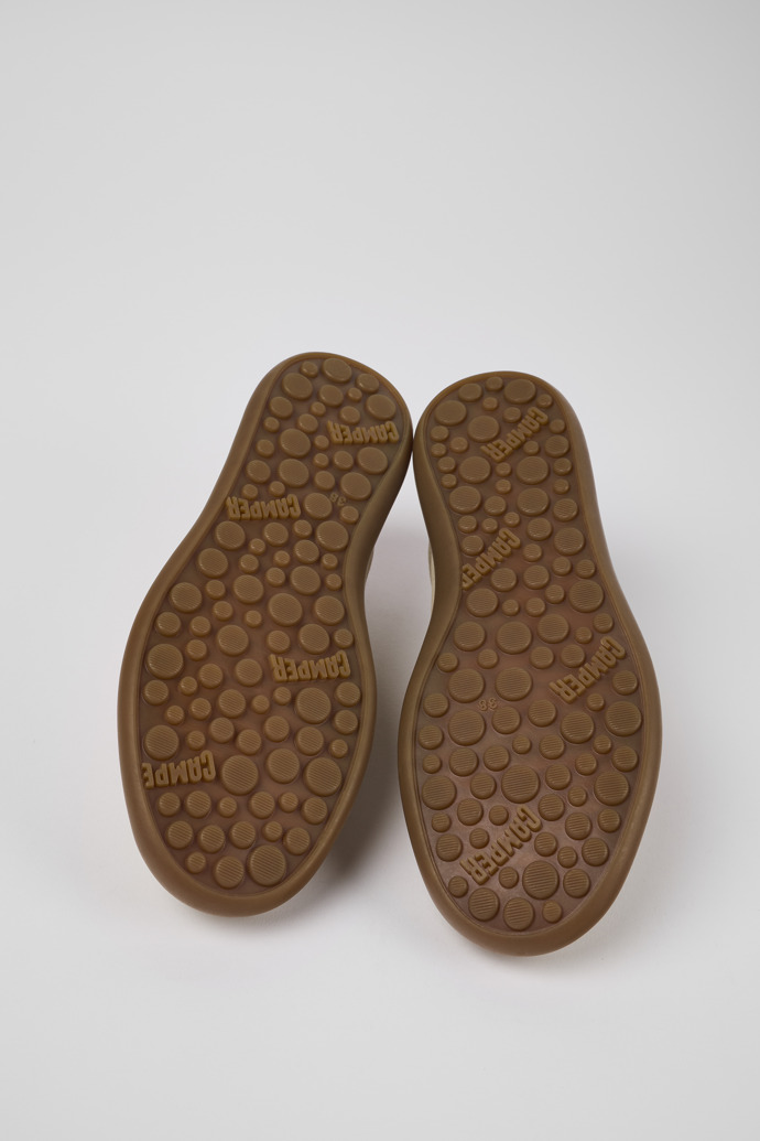 The soles of Pelotas Soller Beige Nubuck/Leather Sneaker for Women