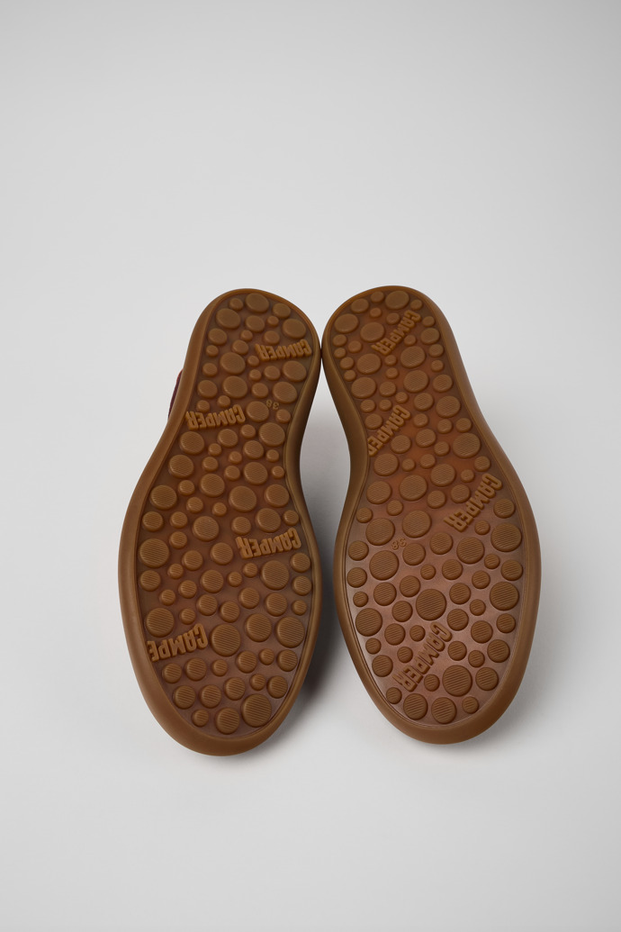 The soles of Pelotas Soller Burgundy Nubuck/Leather Sneaker for Women