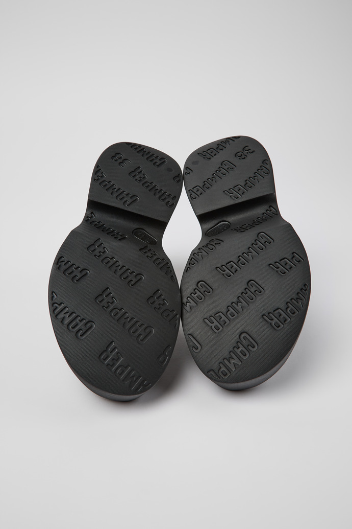 The soles of Tasha Black Textile Cross-strap Sandal for Women