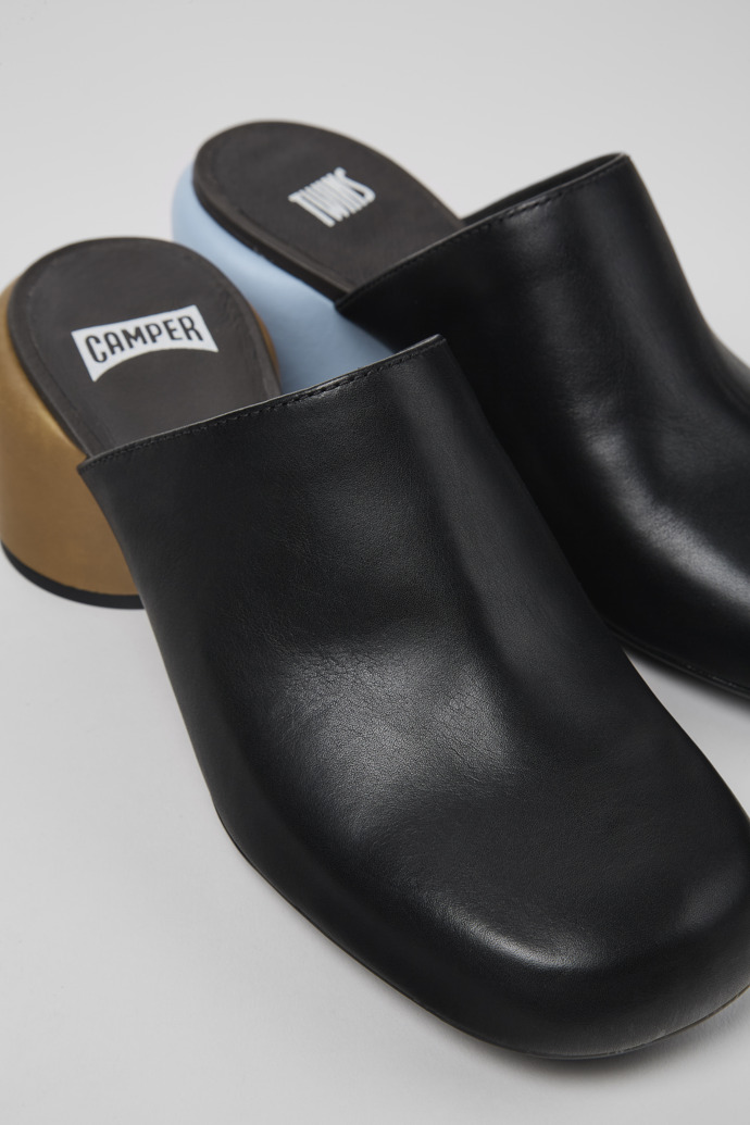 Close-up view of Twins Black Leather Clogs for Women