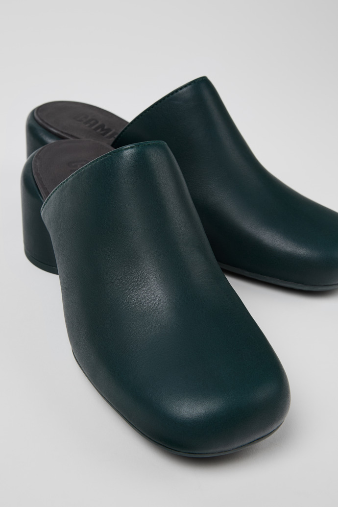 Close-up view of Niki Green Leather Clogs for Women