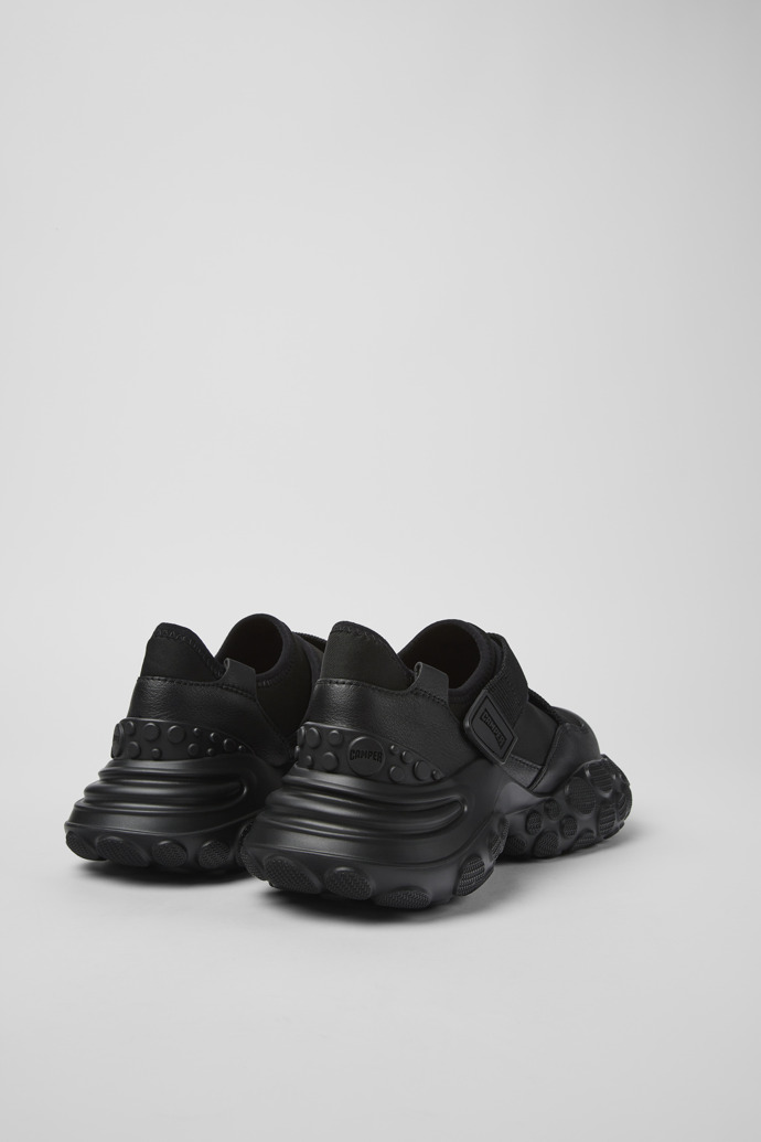 Back view of Pelotas Mars Black Textile/Leather Sneaker for Women