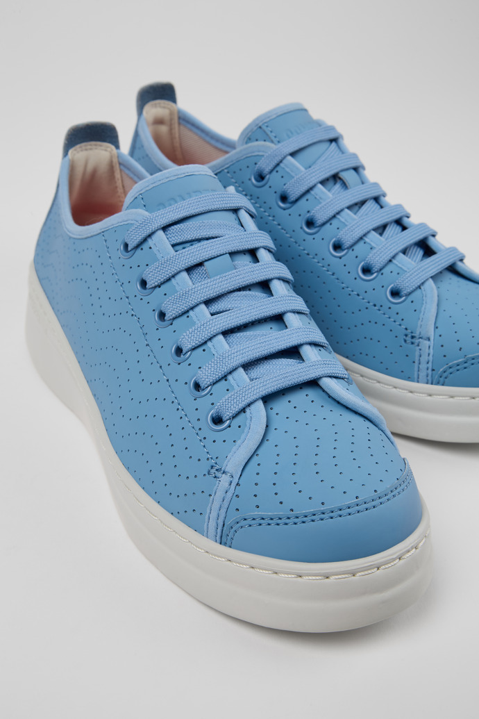 Close-up view of Runner Blue Leather Sneaker for Women