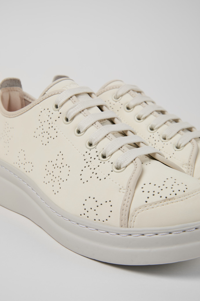 Close-up view of Runner White Recycled Leather Sneakers for Women.