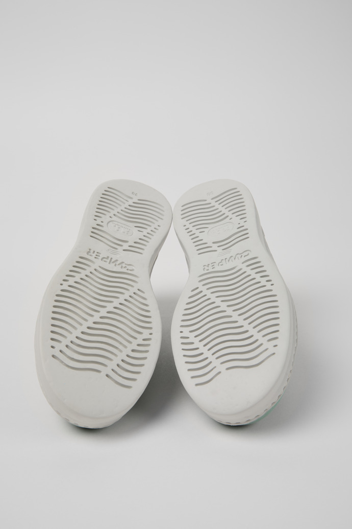 The soles of Runner Green TENCEL® Lyocell and Leather Women's Sneakers.