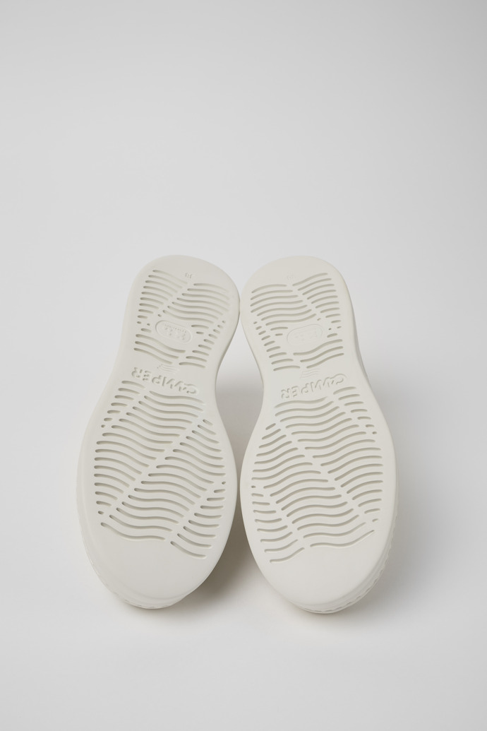 The soles of Runner Up White Leather Women's Sneakers.