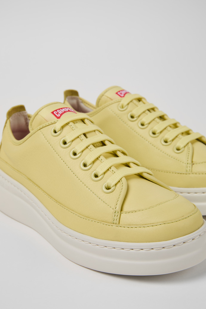 Close-up view of Runner Yellow Leather Sneakers for Women.