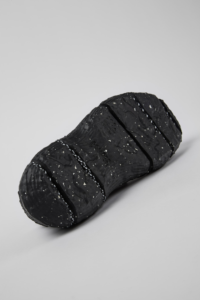 The soles of ROKU Black Sneaker for Women