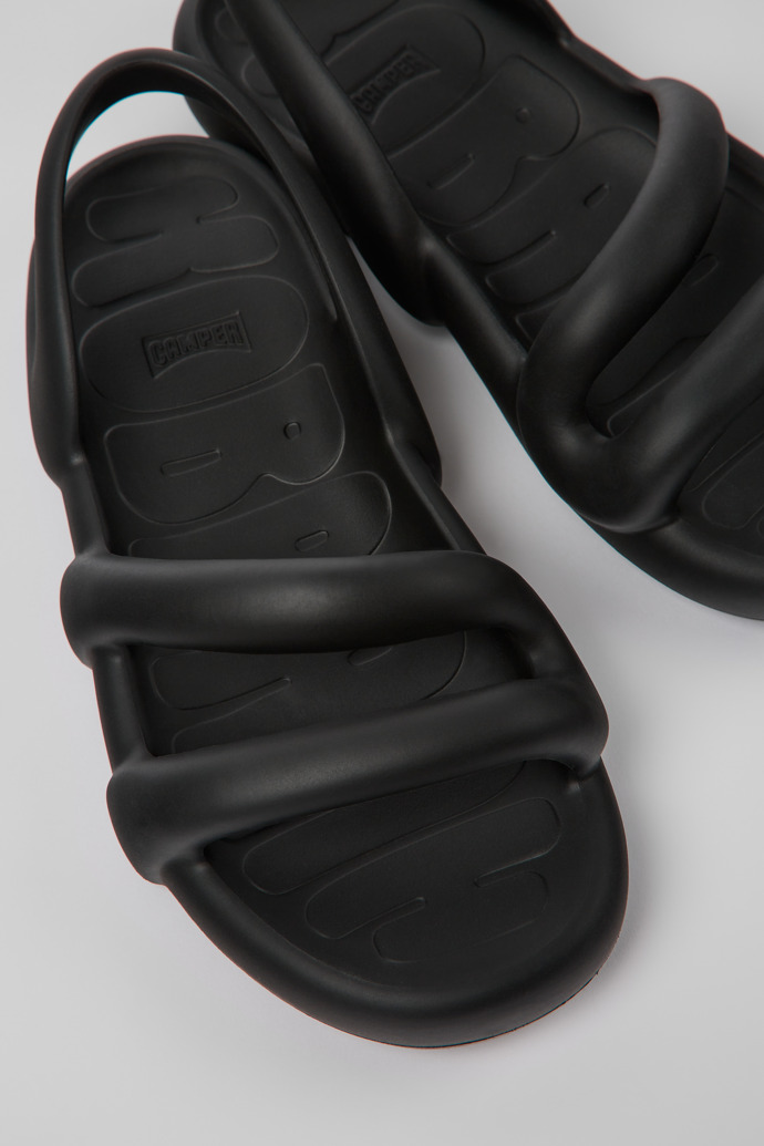 Close-up view of Kobarah Flat Black unisex Sandal