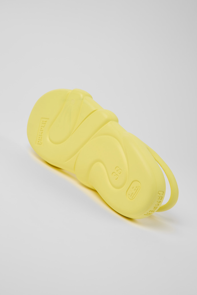 The soles of Kobarah Flat Yellow unisex Sandal