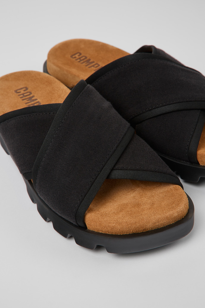 Close-up view of Brutus Sandal Black Textile Cross-strap Sandal for Women