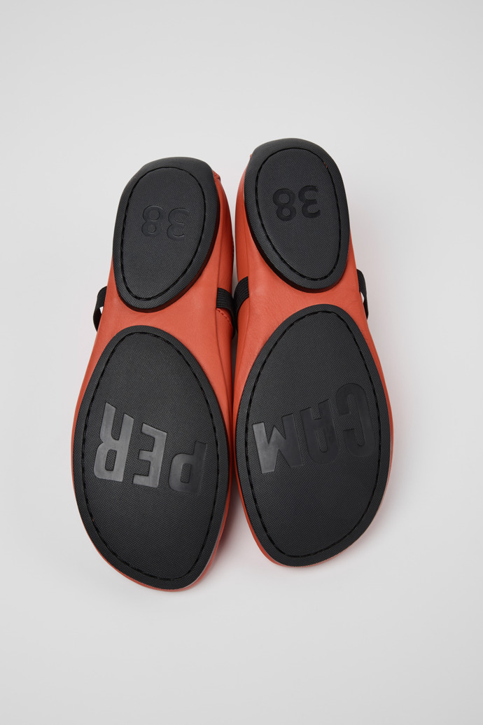 The soles of Right Nina Orange Leather Shoes for Women.