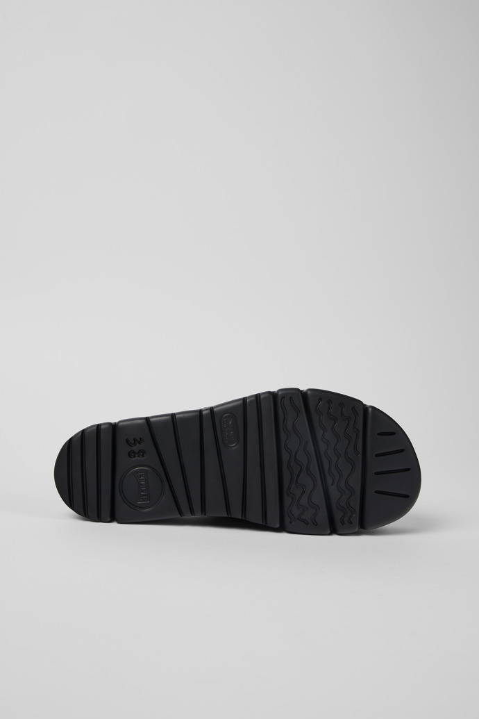 The soles of Oruga Up Black Textile Slide for Women